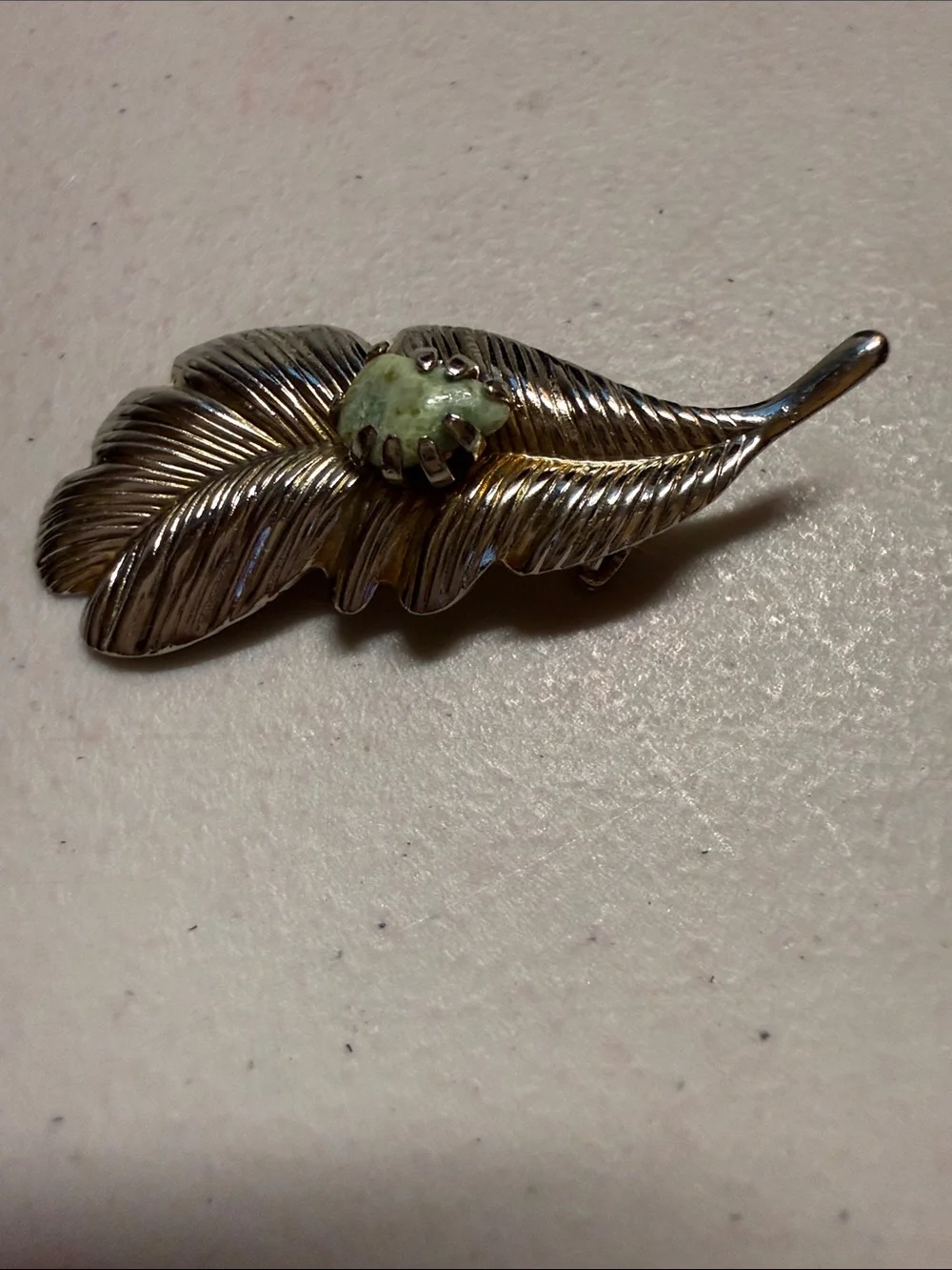 Vintage silvertone feather brooch